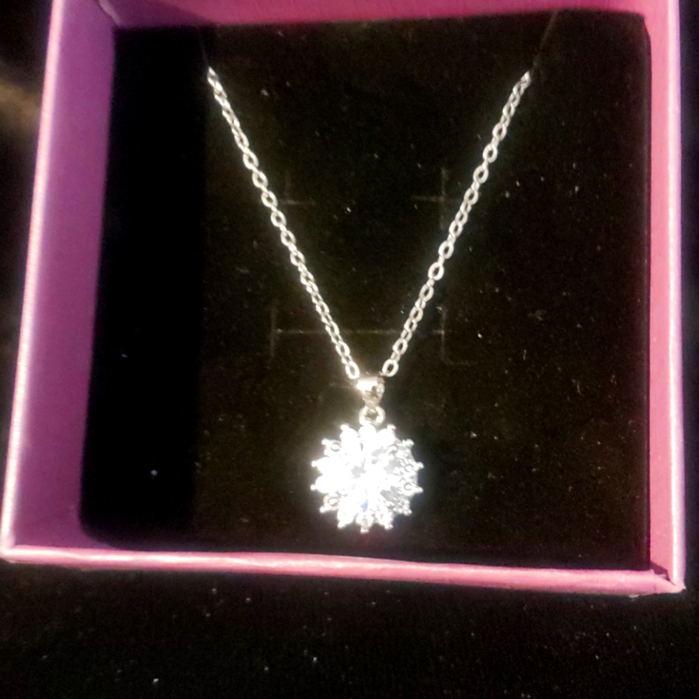 Very thin elegant silver nice and charm